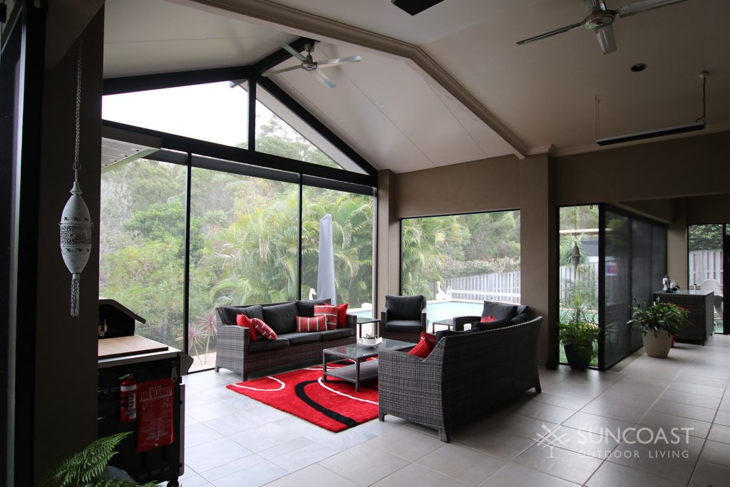 Enclosed patio area with lounge and BBQ in Upper Coomera
