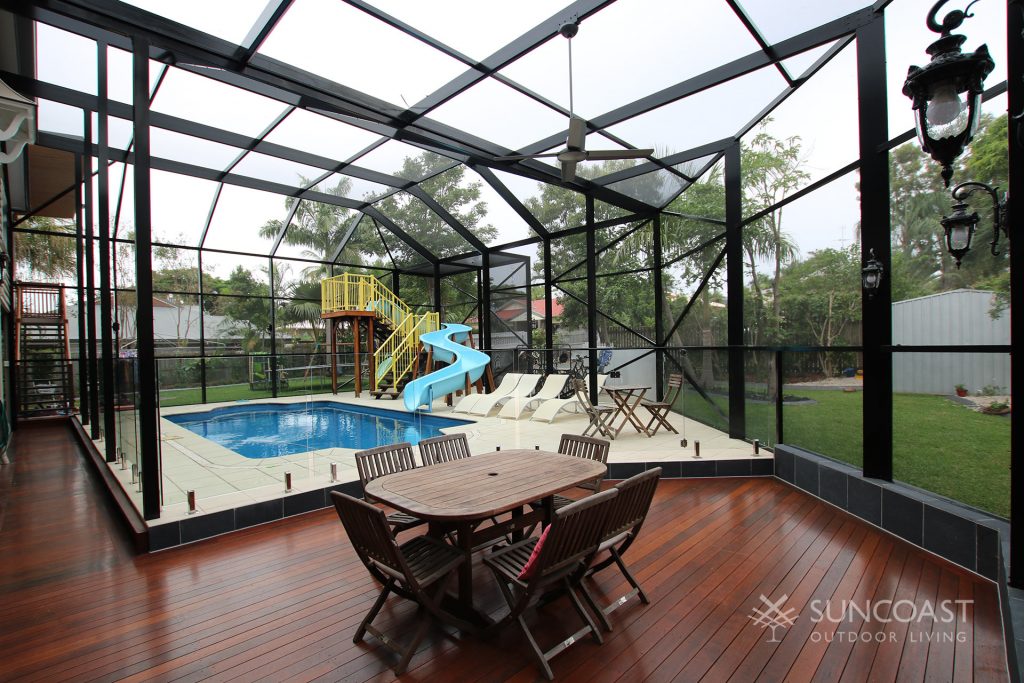 South East QLD mesh enclosure around pool, play and dining area.